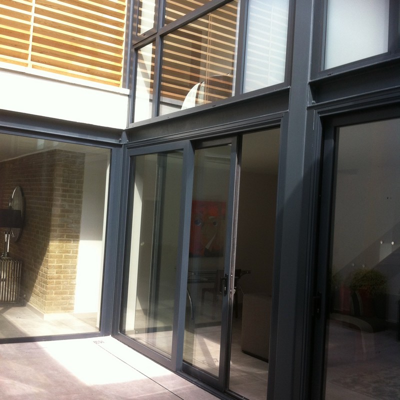 Anthracite aluminium sliding patio doors fitted in Stratford