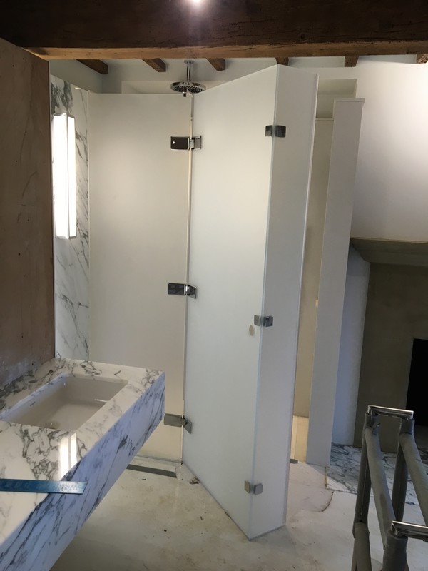 Bespoke frosted glass shower enclosure in Stratford luxury bathroom